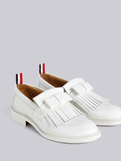 Shop Thom Browne Pebbled Leather Fringe Bow Loafer In White