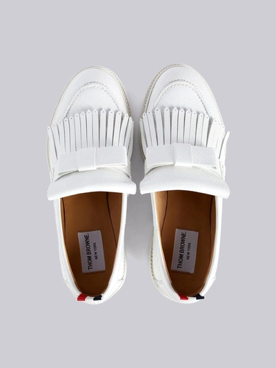 Shop Thom Browne Pebbled Leather Fringe Bow Loafer In White