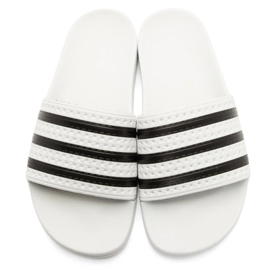 Shop Adidas Originals White And Black Adilette Sandals In White/black