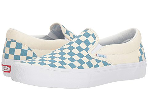 blue and white vans slip ons