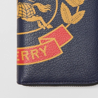 Shop Burberry Crest Print Leather Ziparound Wallet In Storm Blue