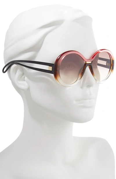 Shop Givenchy 56mm Round Sunglasses - Brown Peach