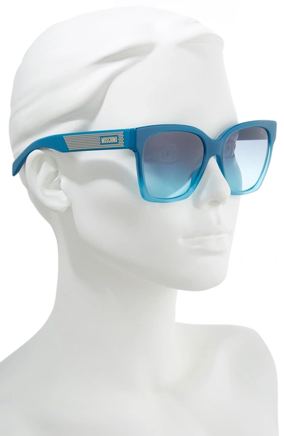 Shop Moschino 56mm Sunglasses - Teal Tea