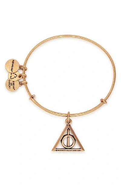 Shop Alex And Ani Harry Potter(tm) Deathly Hallows(tm) Adjustable Wire Bangle In Gold