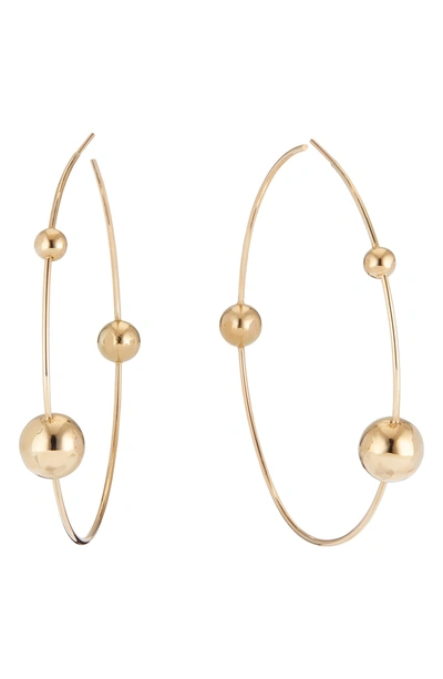 Shop Lana Jewelry Hollow Ball Wire Hoop Earrings In Gold