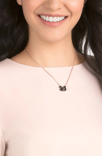 Shop Swarovski Swan Pendant Necklace In Black