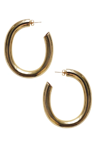 Shop Laura Lombardi Curve Hoop Earrings In Brass