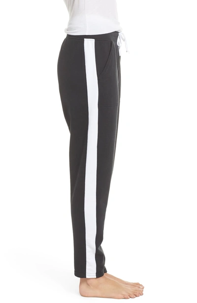 Shop Alternative Stripe Track Pants In Black/ White
