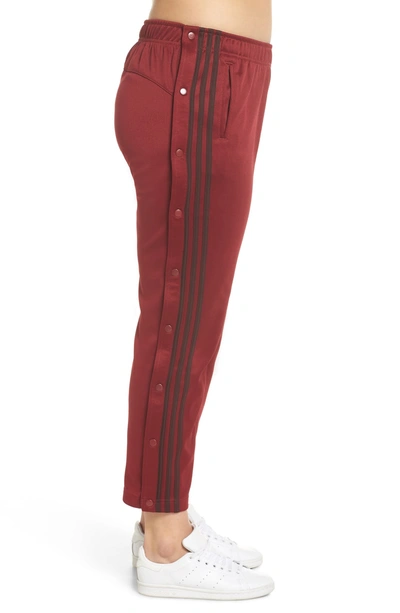 Shop Adidas Originals Tricot Snap Pants In Noble Maroon/ Night Red