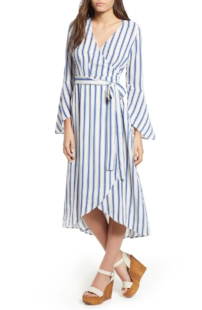 Shop Moon River Stripe Flared Sleeve Wrap Dress In Navy Stripe