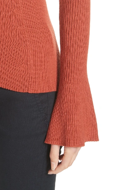 Shop Tory Burch Liv Merino Wool Sweater In Light Rusted Red