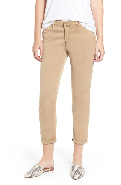 Shop Ag Caden Crop Twill Trousers In Sulfur Toasted
