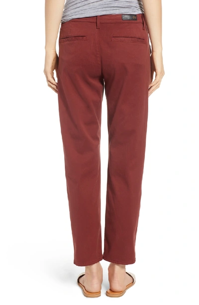 Shop Ag Caden Crop Twill Trousers In Tannic Red