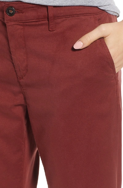Shop Ag Caden Crop Twill Trousers In Tannic Red