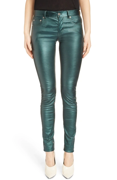 Shop Saint Laurent Metallic Leather Skinny Pants In Green