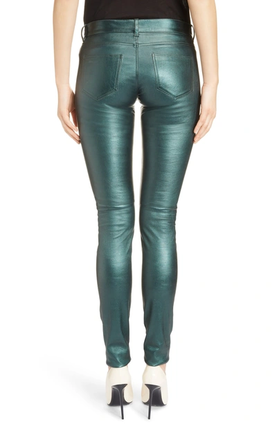 Shop Saint Laurent Metallic Leather Skinny Pants In Green