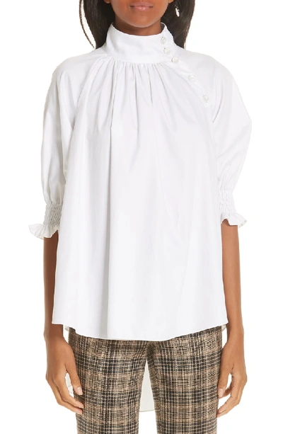 Shop Adam Lippes Cotton Poplin Smocked Blouse In White