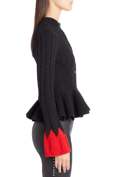Shop Alexander Mcqueen Contrast Cuff Rib Knit Peplum Cardigan In Black/ Red