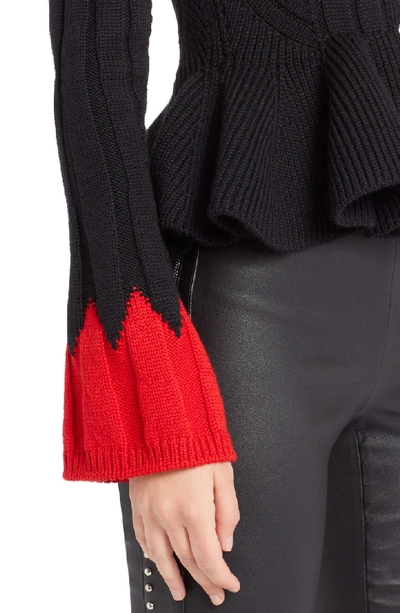 Shop Alexander Mcqueen Contrast Cuff Rib Knit Peplum Cardigan In Black/ Red