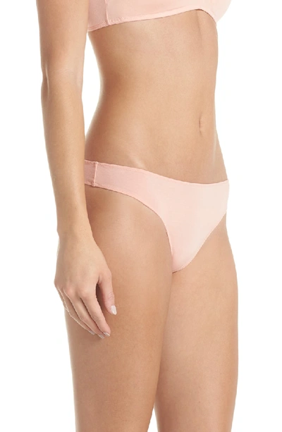 Shop Madewell Jersey Thong In Blanched Coral