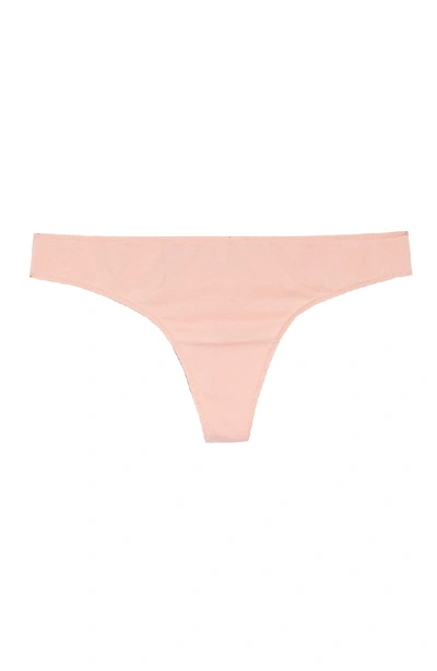 Shop Madewell Jersey Thong In Blanched Coral