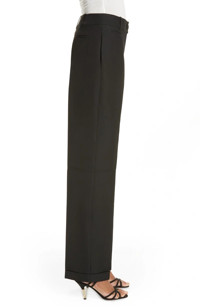 Shop Jacquemus Cuffed Pants In Black