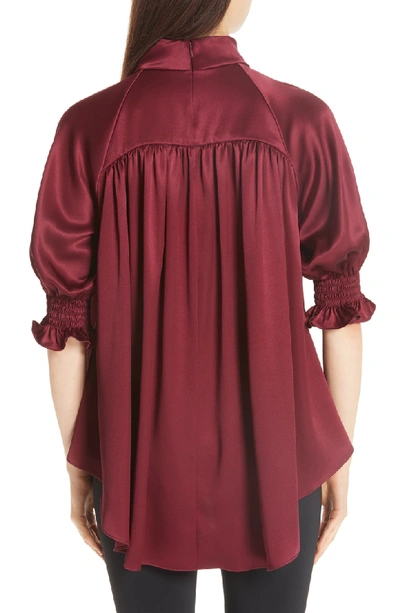 Shop Adam Lippes Silk Charmeuse Smocked Blouse In Burgundy