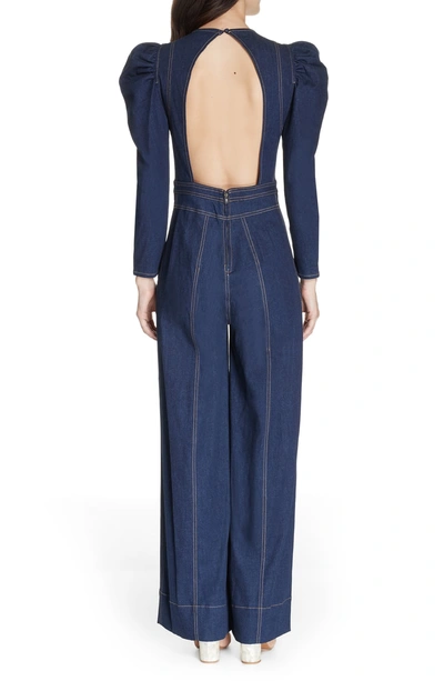 Shop Ulla Johnson Dawn Puff Shoulder Denim Jumpsuit In Indigo