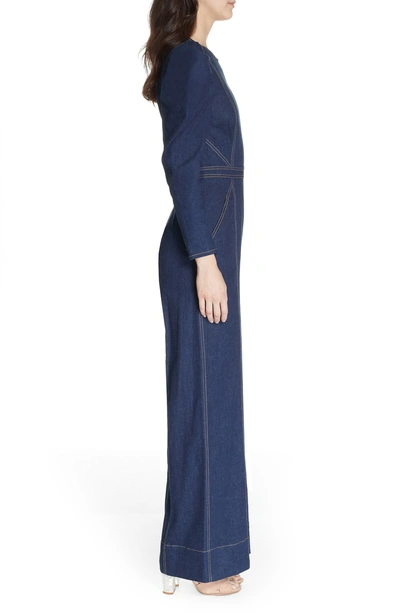 Shop Ulla Johnson Dawn Puff Shoulder Denim Jumpsuit In Indigo