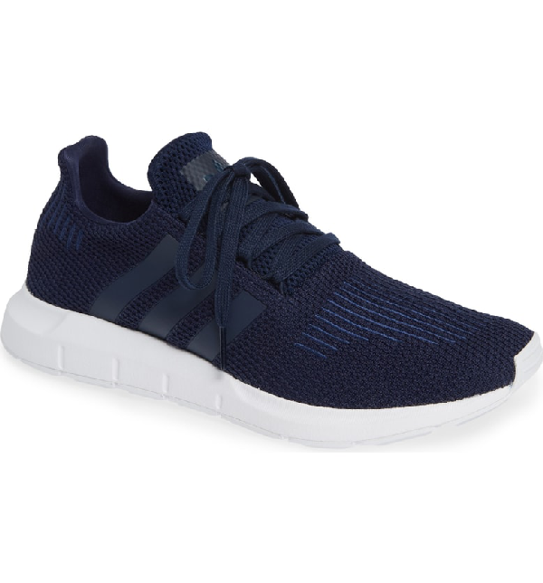 navy blue adidas swift run