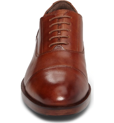 Shop Cole Haan Harrison Grand Cap Toe Oxford In British Tan Leather