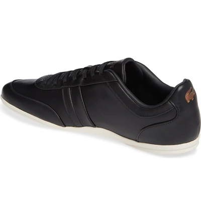 Shop Lacoste Storda Low Top Sneaker In Black/ Off White Leather