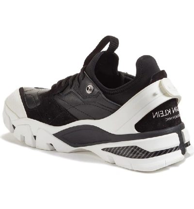 Shop Calvin Klein 205w39nyc Carlos 10 Snapback Runner Sneaker In Black Leather