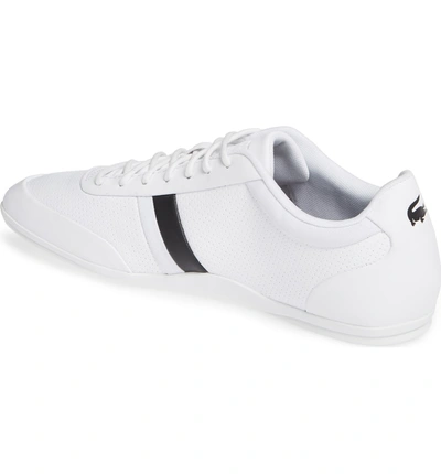 Shop Lacoste Storda Low Top Sneaker In White/ Black