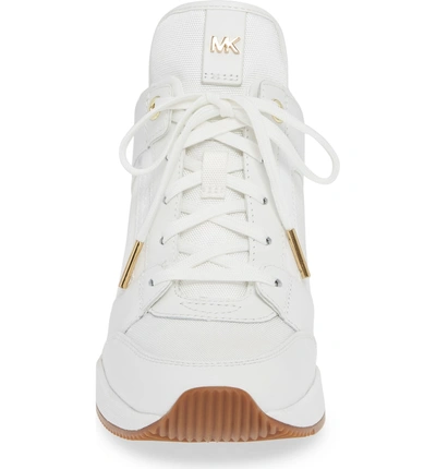 Shop Michael Michael Kors Georgie Wedge Sneaker In Optic White Fabric