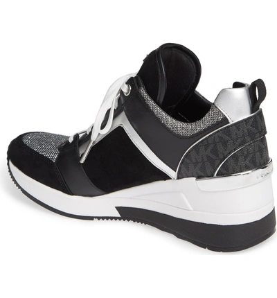 Shop Michael Michael Kors Georgie Wedge Sneaker In Black Suede