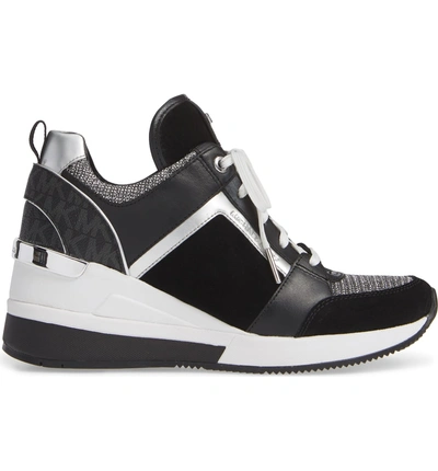 Shop Michael Michael Kors Georgie Wedge Sneaker In Black Suede