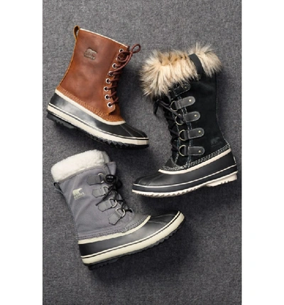 Shop Sorel 'joan Of Arctic' Waterproof Snow Boot In Black/ Stone