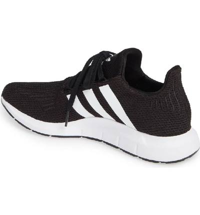 Shop Adidas Originals Swift Run Sneaker In Black/ White