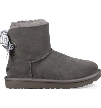 Shop Ugg Customizable Bailey Bow Mini Genuine Shearling Bootie In Charcoal Suede