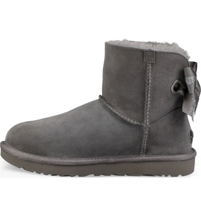 Shop Ugg Customizable Bailey Bow Mini Genuine Shearling Bootie In Charcoal Suede