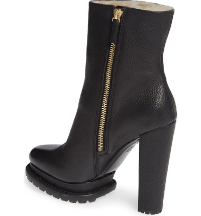 Shop Alice And Olivia Holden Genuine Shearling Bootie In Black