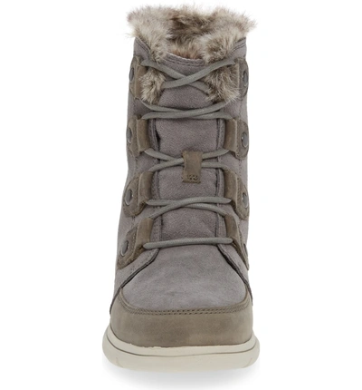 Shop Sorel Explorer Joan Waterproof Boot With Faux Fur Collar In Quarry/ Black