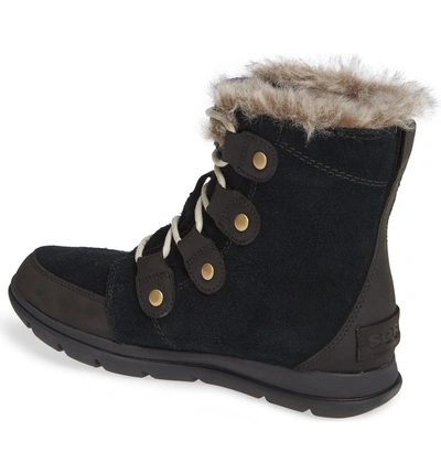 Shop Sorel Explorer Joan Waterproof Boot With Faux Fur Collar In Black/ Dark Stone