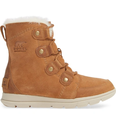 Shop Sorel Explorer Joan Waterproof Boot With Faux Fur Collar In Camel Brown