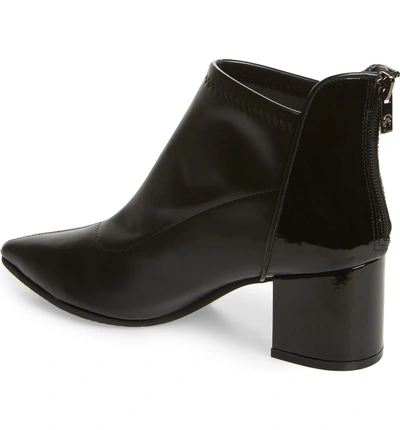 Shop Adrianna Papell Honey Pointy Toe Stretch Bootie In Black Stretch