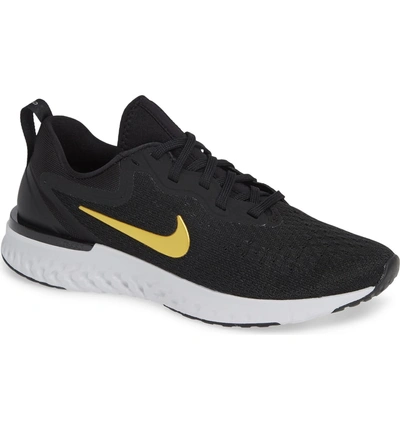 Shop Nike Odyssey React Running Shoe In Black/ Metallic Gold-vast Grey