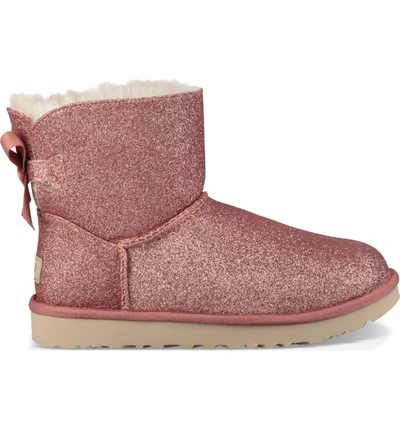 Shop Ugg Mini Bailey Bow Sparkle Genuine Shearling Boot In Pink