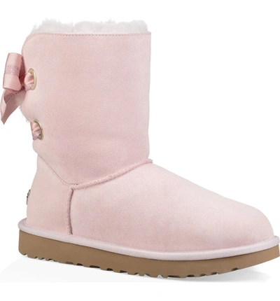 Shop Ugg Customizable Bailey Bow Genuine Shearling Bootie In Seashell Pink Suede