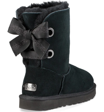 Shop Ugg Customizable Bailey Bow Genuine Shearling Bootie In Black Suede